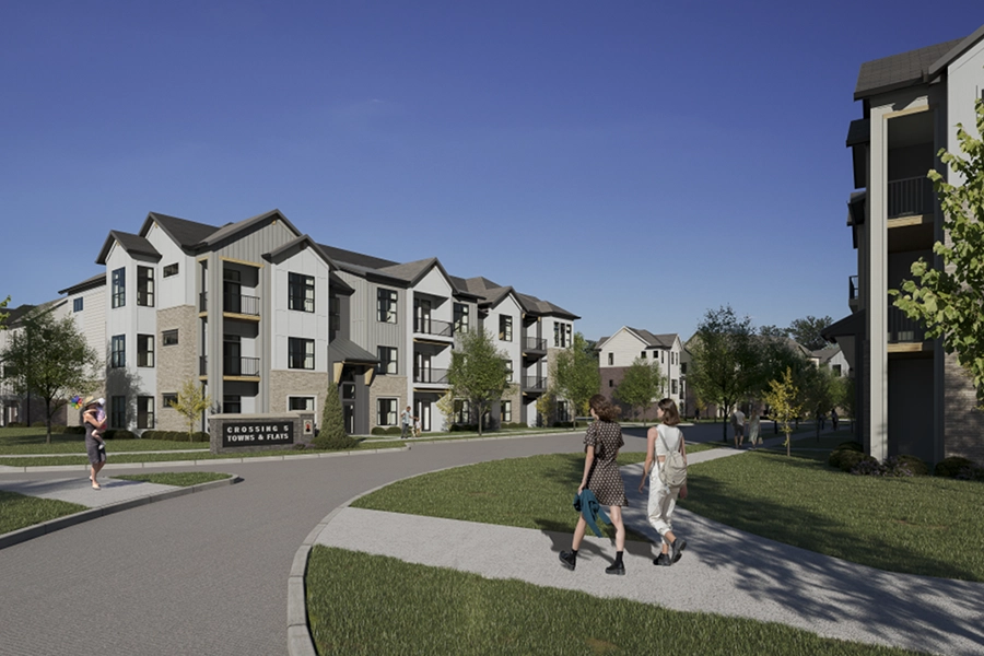 Not all Carmel apartment communities offer coach homes like Crossing 5 does. Two women walking through an apartment community